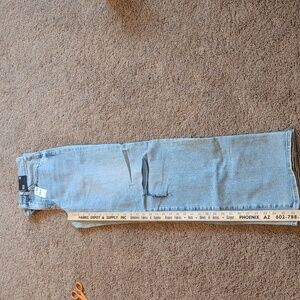 Express wide leg high-rise jeans. NWT. Size 4 R. Light wash, distressed.